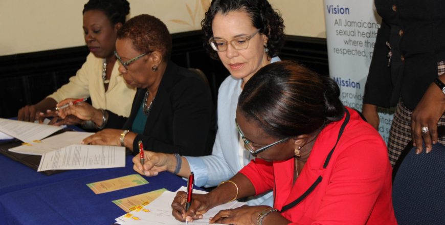 Representatives of the National Family Planning Board (NFPB) and the Statistical Institute of Jamaica (STATIN) sign the contract for the 2019 Reproductive Health Survey. Pictured at right is Executive Director of the NFPB Lovette Byfield, accompanied by NFPB Board Member, Dr. Diana Thorburn (second right). Also pictured (from left): STATIN Legal Officer, Gillian Johns, and Director General, Carol Coy.